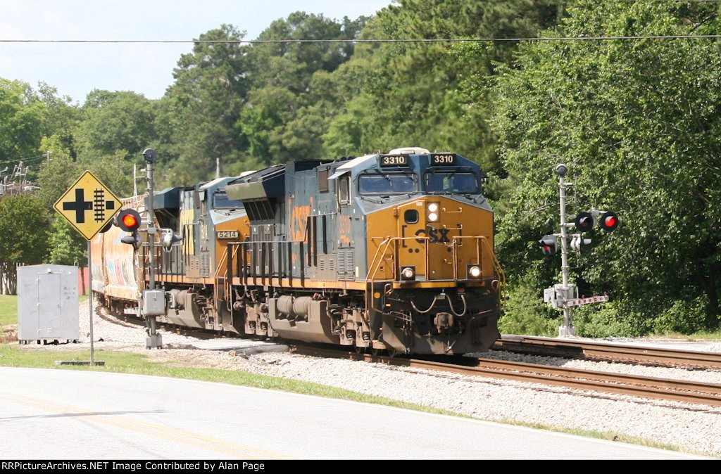CSX 3310 and 5214 cross College St